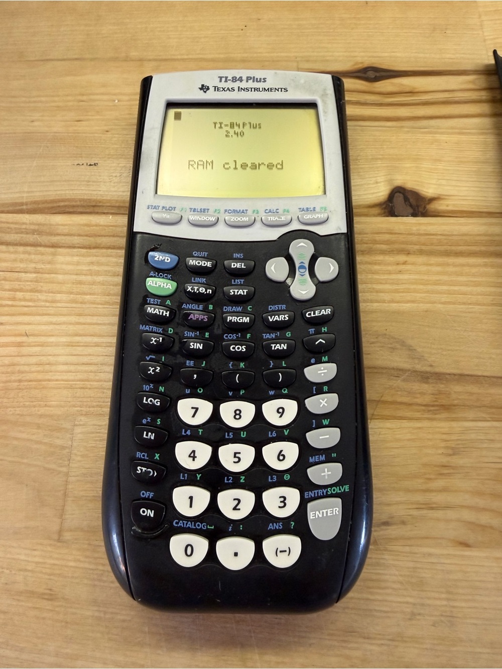 Texas Instruments TI-84 Plus Graphing Calculator - Black and White Keys